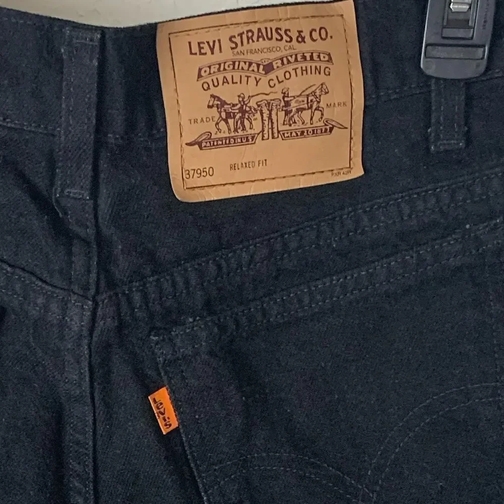 Vintage Levi’s 950 Relaxed Fit High Rise Denim Shorts Orange Tab